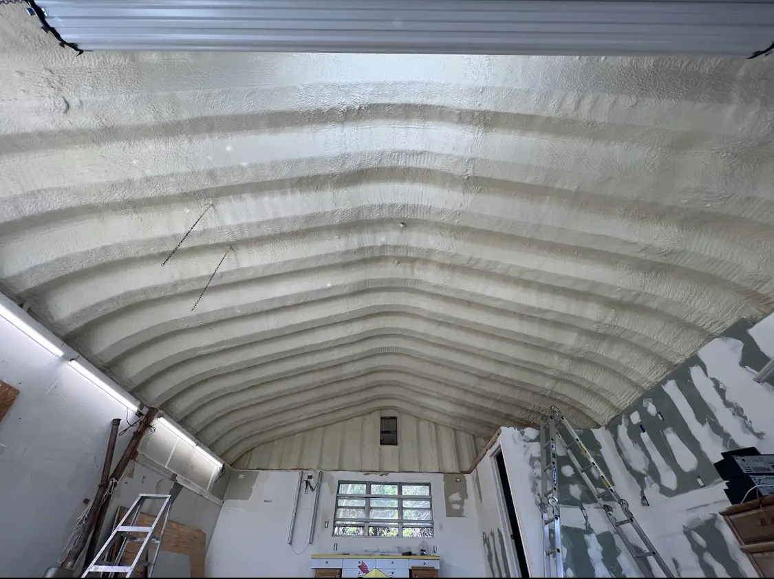 Spray polyurethane foam applied to the underside of a metal roof deck in Bonney Lake